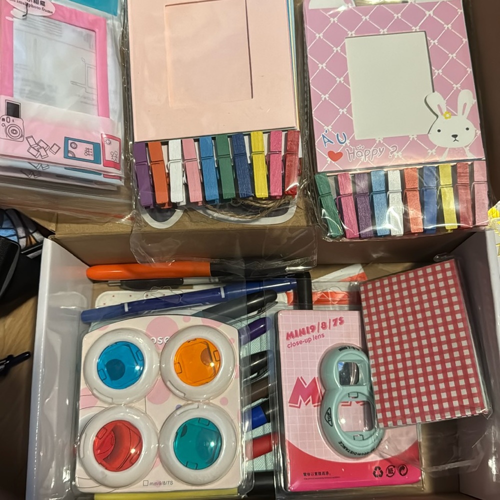 Miscellaneous box of polaroid items